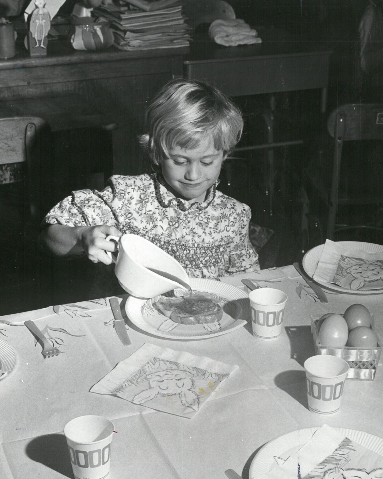 Sandra Massey, of Savoy Elementary School, tries the syrup made by students in Charlene Sullivan's thrid and fourth grade class and Janet LeClair's kindergarten class.